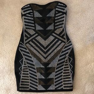 Aztec designed dress. Gold black and silver beads